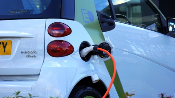 Electric car plugged in and recharging